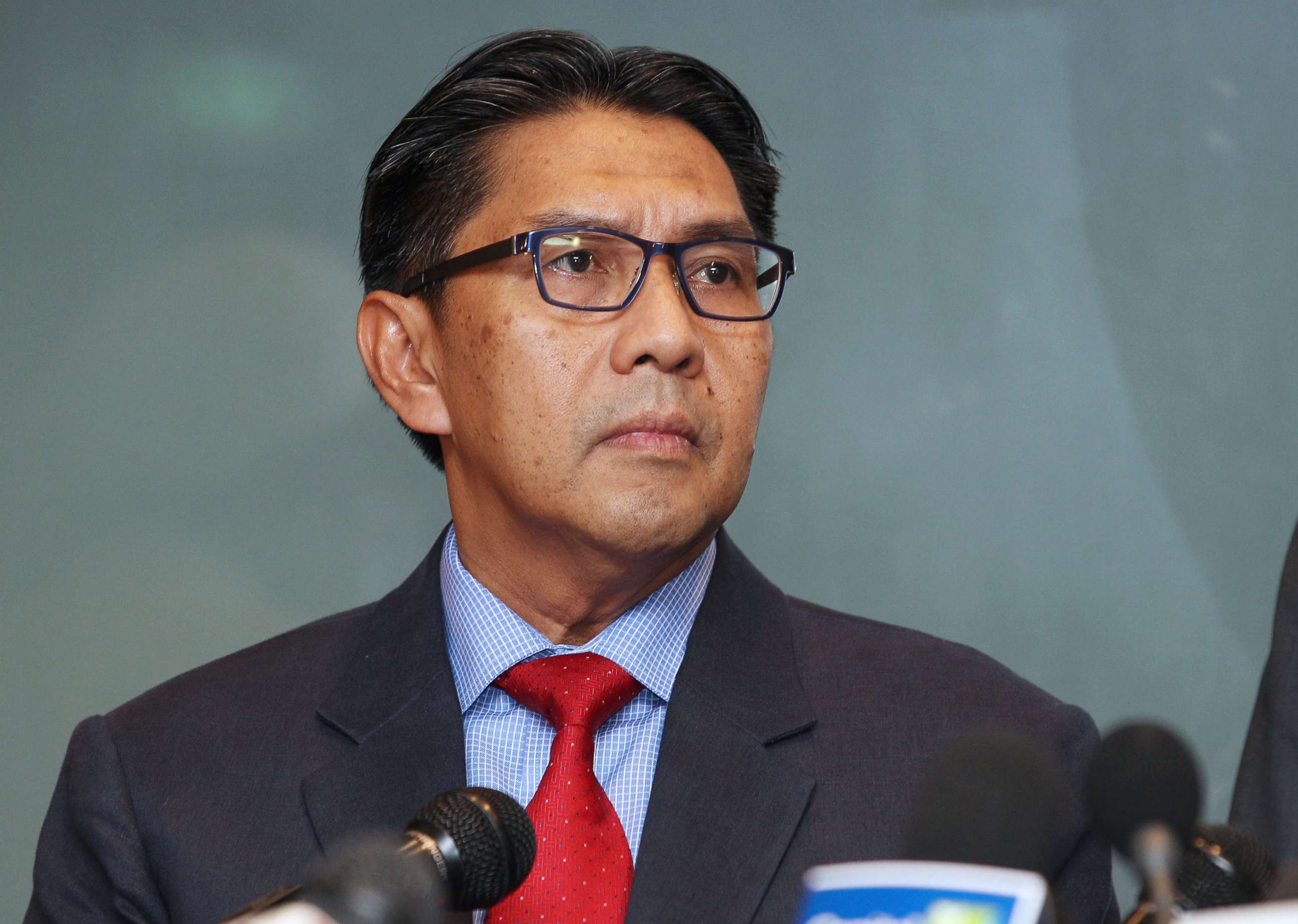 PHOTO: In this file photo, Azharuddin Abdul Rahman, director general of Malaysia's Department of Civil Aviation, pauses during a news conference in Sepang, Malaysia, March 20, 2014.
