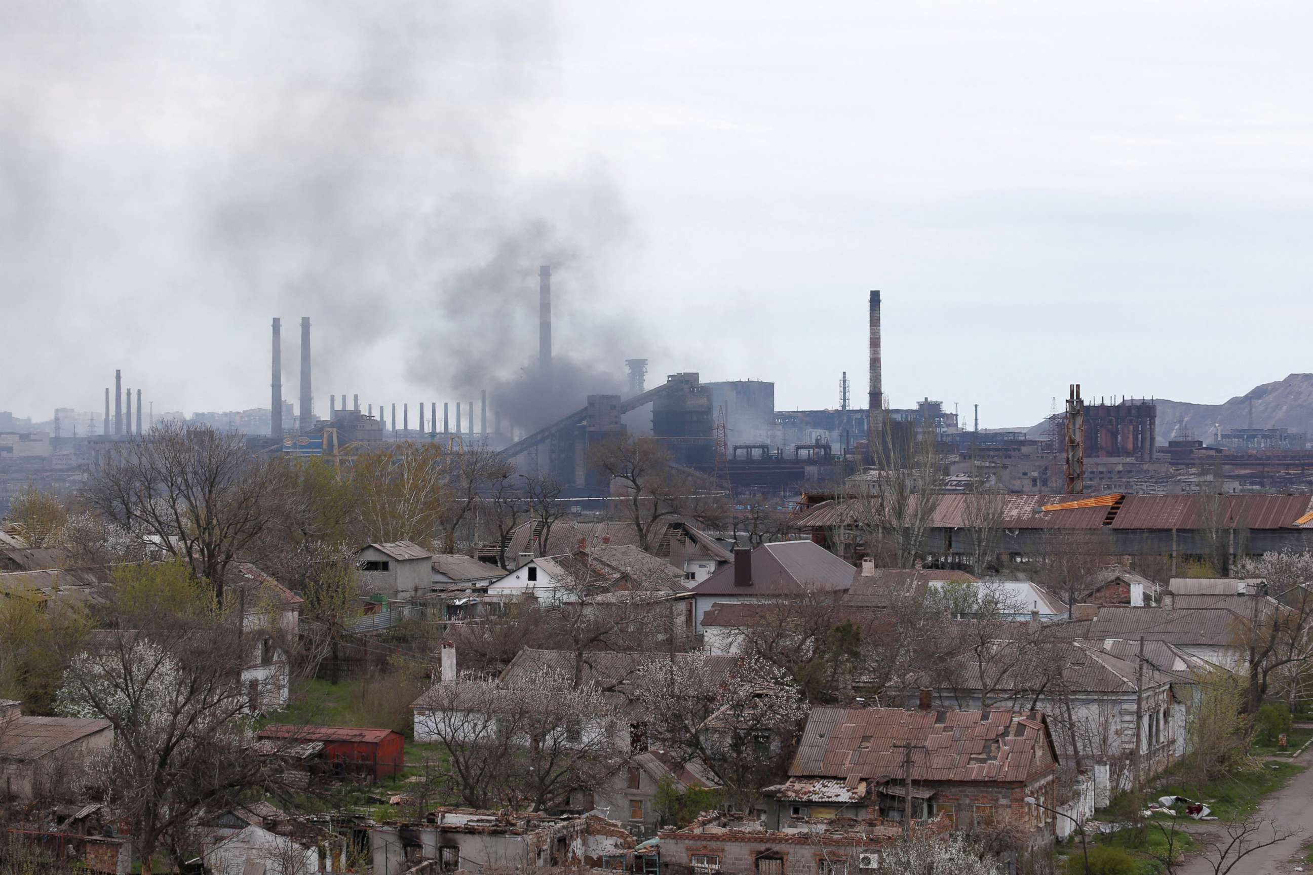 PHOTO: Smoke rises above a plant of Azovstal Iron and Steel Works during Ukraine-Russia conflict in the southern port city of Mariupol, Ukraine, April 21, 2022. 