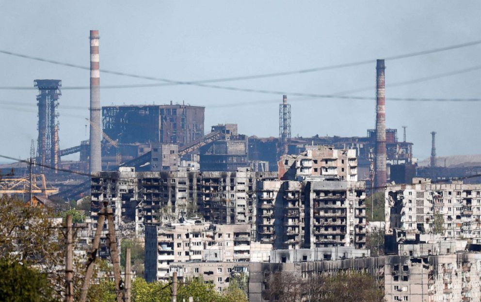 PHOTO: A view shows a plant of Azovstal Iron and Steel Works behind damaged residential buildings during Ukraine-Russia conflict in the southern port city of Mariupol, Ukraine, May 8, 2022.