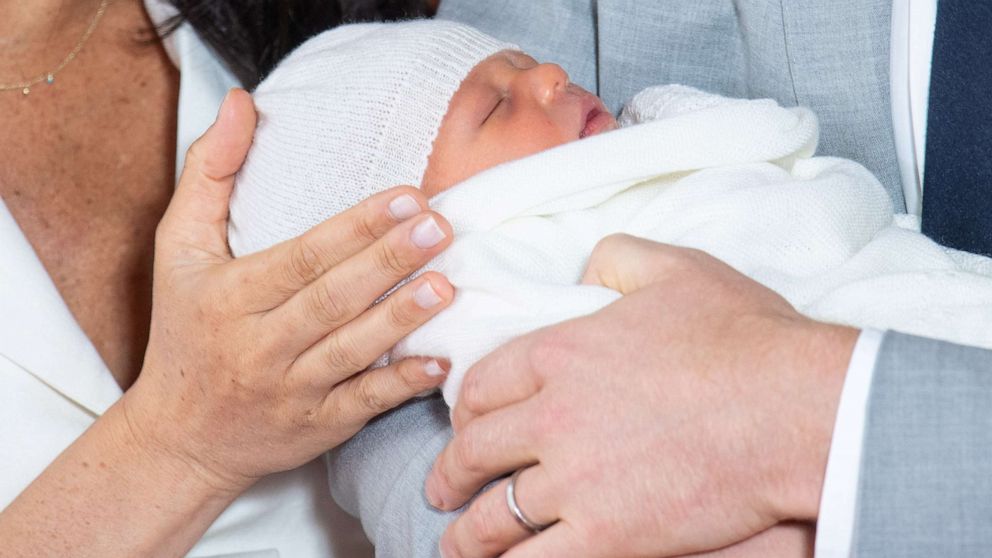 PHOTO: Prince Harry and Meghan, Duchess of Sussex are seen with their baby son, who was born on Monday morning, during a photocall in St George's Hall at Windsor Castle, England, May 8, 2019. 