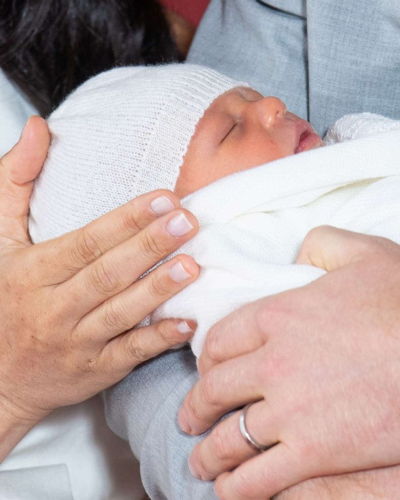 PHOTO: Prince Harry and Meghan, Duchess of Sussex are seen with their baby son, who was born on Monday morning, during a photocall in St George's Hall at Windsor Castle, England, May 8, 2019. 