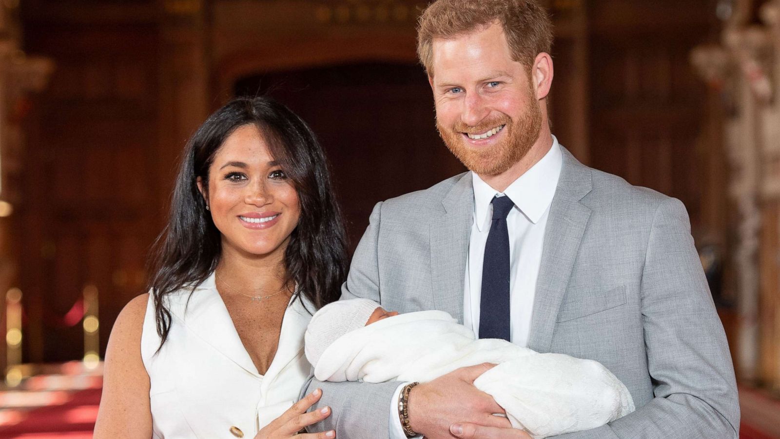 PHOTO:Prince Harry and his wife Meghan, Duchess of Sussex, pose for a photo with their newborn baby son in St George's Hall at Windsor Castle in Windsor, England, May 8, 2019.