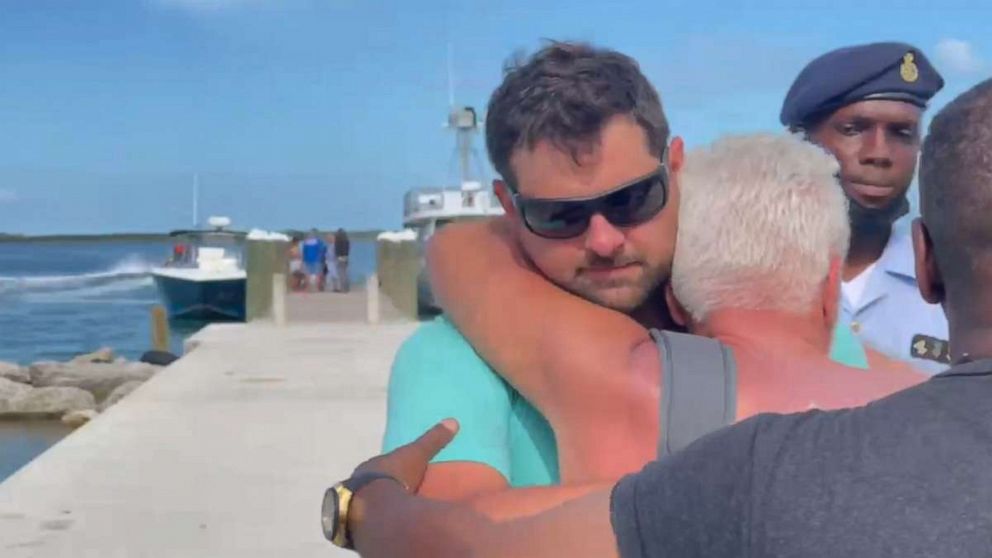 PHOTO: In this frame from the video people arrive    in location where 58-year- an elderly woman from Pennsylvania was killed by a bull shark attack off    Rose Island in Bahamas. 