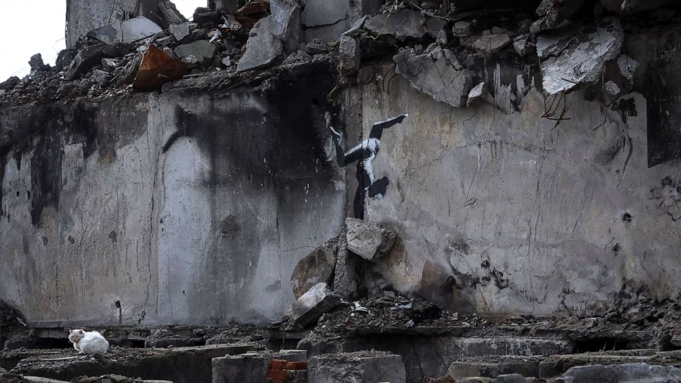 PHOTO: A work of world-renowned graffiti artist Banksy is seen at the wall of destroyed building in the Ukrainian town of Borodianka, on Nov. 12, 2022.