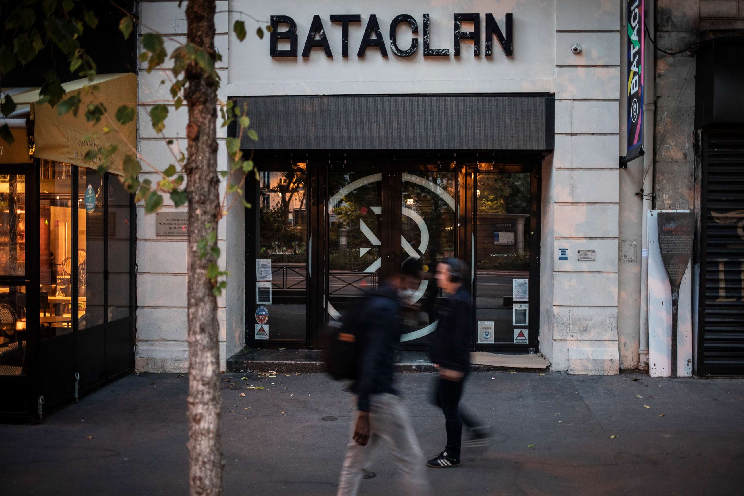 PHOTO: Pedestrians walk past the entrance of the Bataclan theatre on Sept. 7, 2021, in Paris. In November 2015, three teams of jihadists launched a suicide-bombing and gun assault on bars, restaurants and the Bataclan concert hall, killing 130.