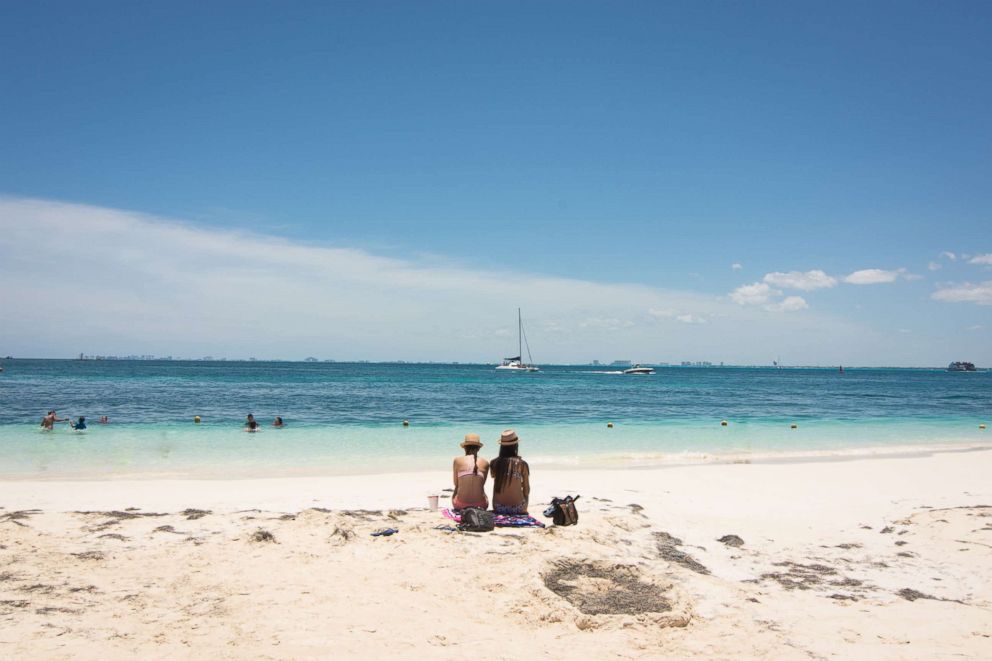 PHOTO: Beach resort hotels and beach chairs along the Riviera Maya near Cancun, Mexico. An idyllic travel destination for a holiday vacation and winter tropical climate get-away.