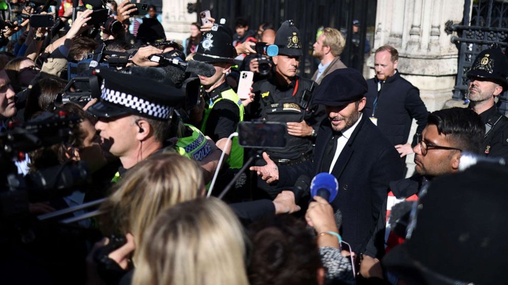 PHOTO: David Beckham speaks to the media after paying his respects to Queen Elizabeth lying in state, following her death, in London, Sept. 16, 2022.