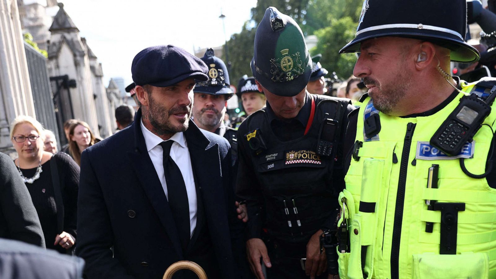 PHOTO: David Beckham leaves after paying his respects to Queen Elizabeth lying in state, following her death, in London, Sept. 16, 2022.