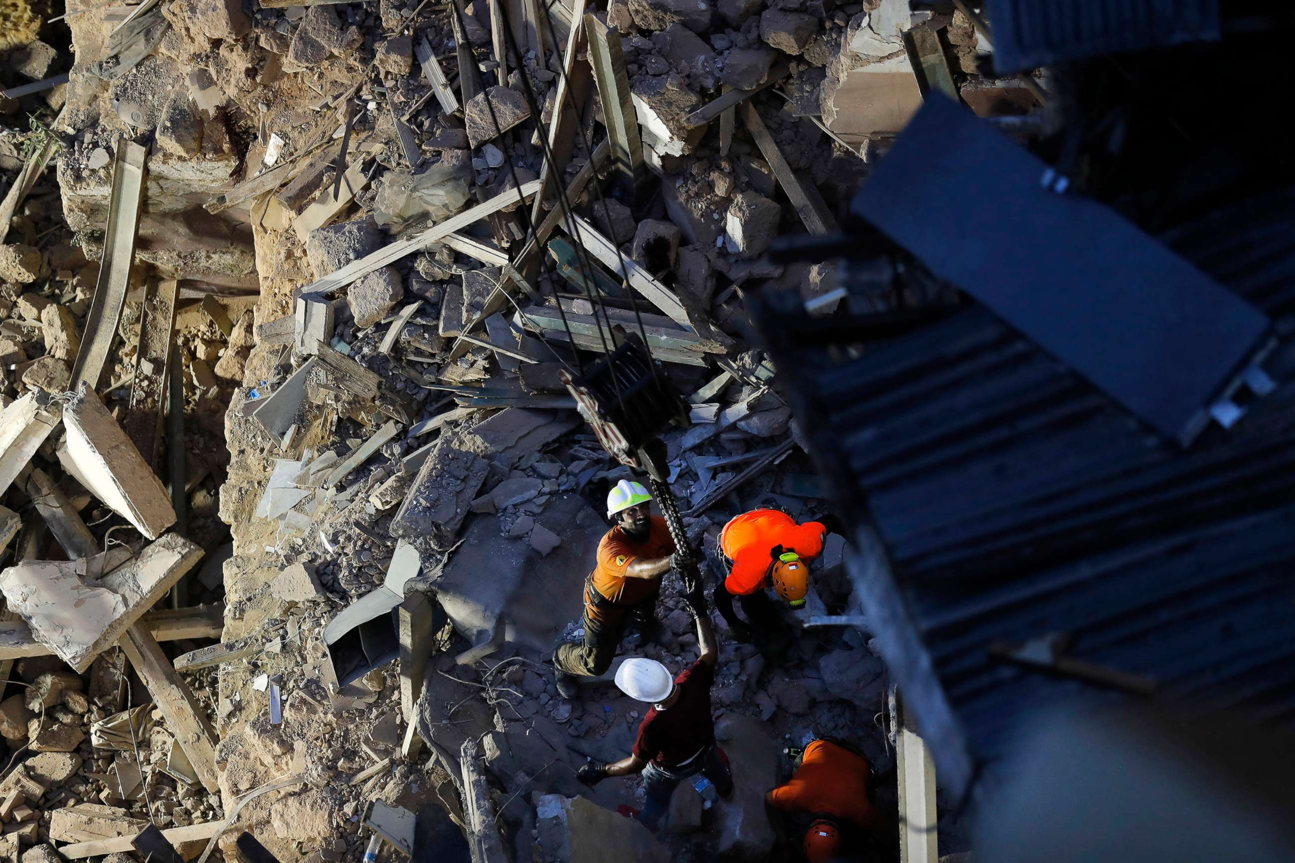 PHOTO: Lebanese and Chilean rescuers work at the site of a collapsed building after getting signals there may be a survivor under the rubble, in Beirut, Sept. 4, 2020. 