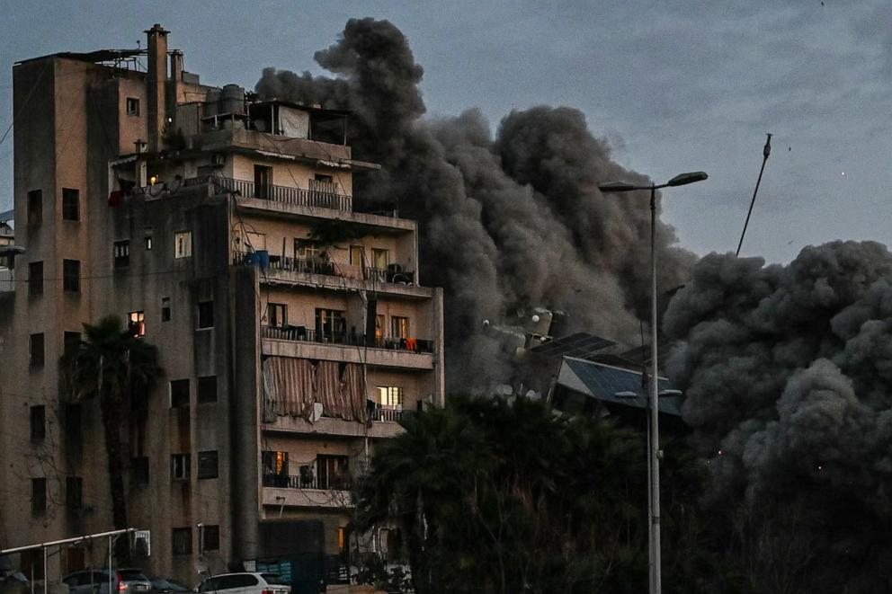 PHOTO: A building collapses after an Israeli airstrike in Beirut's Bashoura neighbourhood early on March 18, 2026.