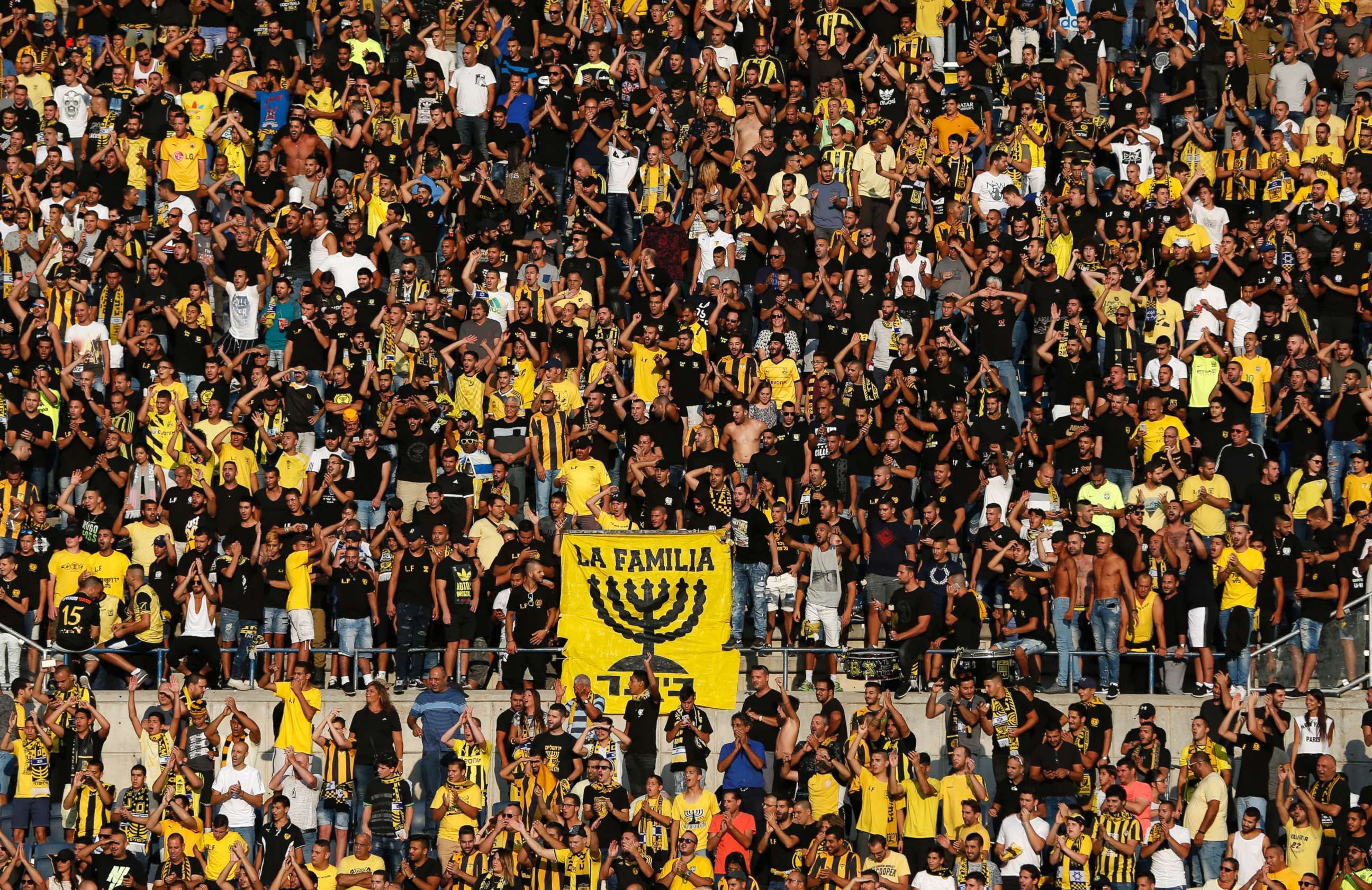 PHOTO: Beitar Jerusalem fans cheer on their team prior to a play-off football match between Beitar Jerusalem and AS Saint-Etienne, at the Itztadion Teddy Stadium in Jerusalem on Aug. 17, 2016.