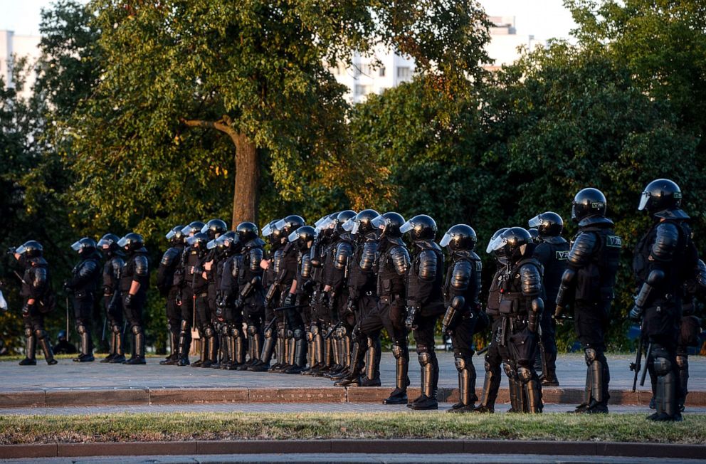 PHOTO: Riot police officers stand guard during a protest the day after the presidential election, in Minsk, Belarus, Aug. 10, 2020. 