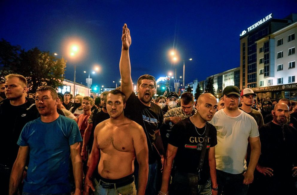 PHOTO: People react during a protest the day after the presidential election, in Minsk, Belarus, Aug. 10, 2020. 

