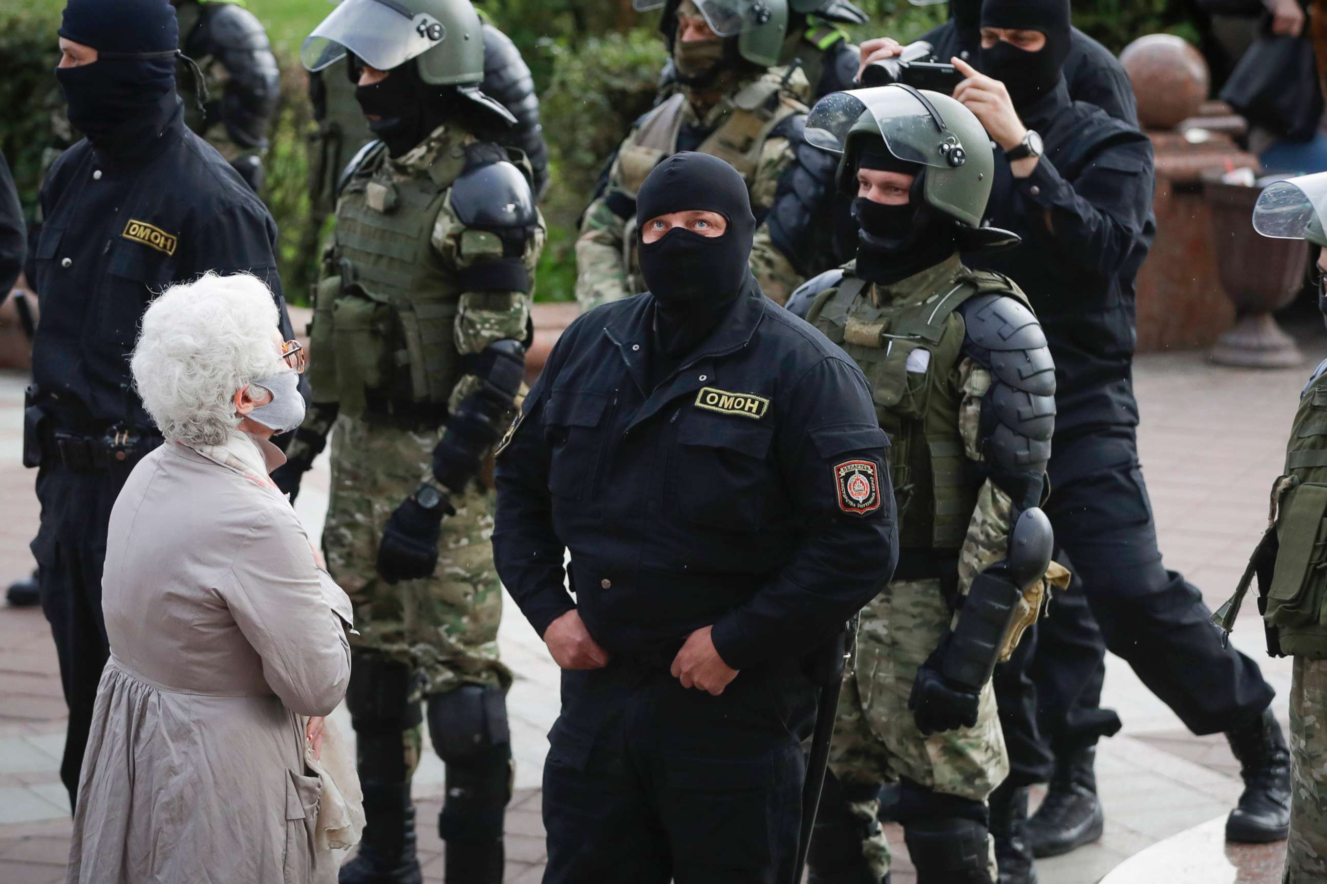 PHOTO: A woman reacts in front of a riot police blockade during a protest at the Independence Square in Minsk, Belarus, Thursday, Aug. 27, 2020. Police in Belarus have dispersed protesters who gathered on the capital's central square, detaining dozens.