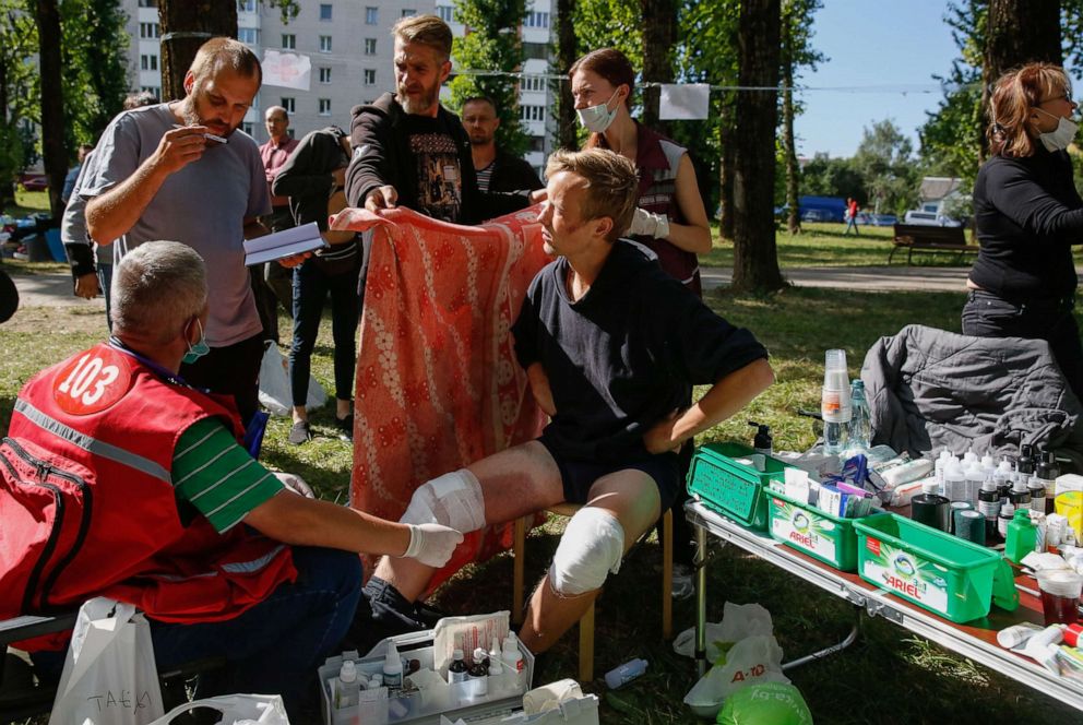 PHOTO: Doctors provide medical treatment to people, who were reportedly tortured and beaten by the police, after they were released from a detention center in Minsk, Belarus, Aug. 14, 2020.