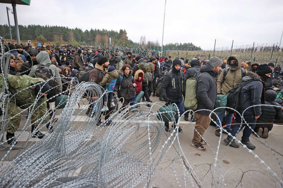 PHOTO: Migrants gather on the Belarusian-Polish border near the Polish Kuznica border crossing on Nov. 15, 2021. 