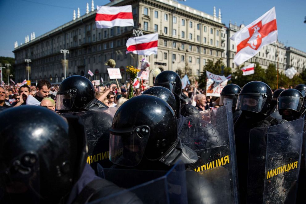 PHOTO: Belarus special police troops block a street as opposition supporters rally to protest against disputed presidential elections results in Minsk, Belarus, Aug. 30, 2020.