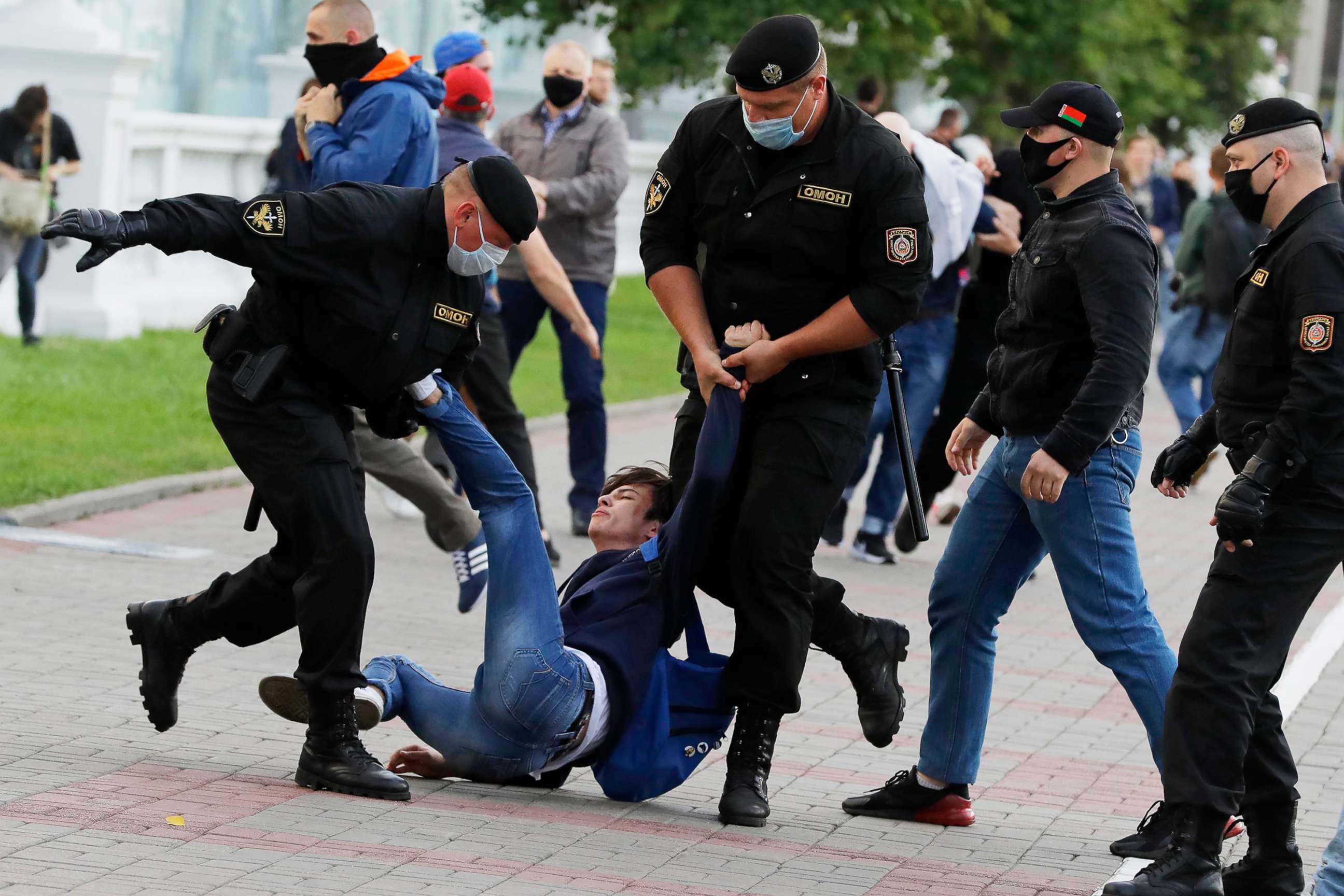 PHOTO: Police officers detain a protester during a rally against the removal of opposition candidates from the presidential elections in Minsk, Belarus, July 14, 2020.