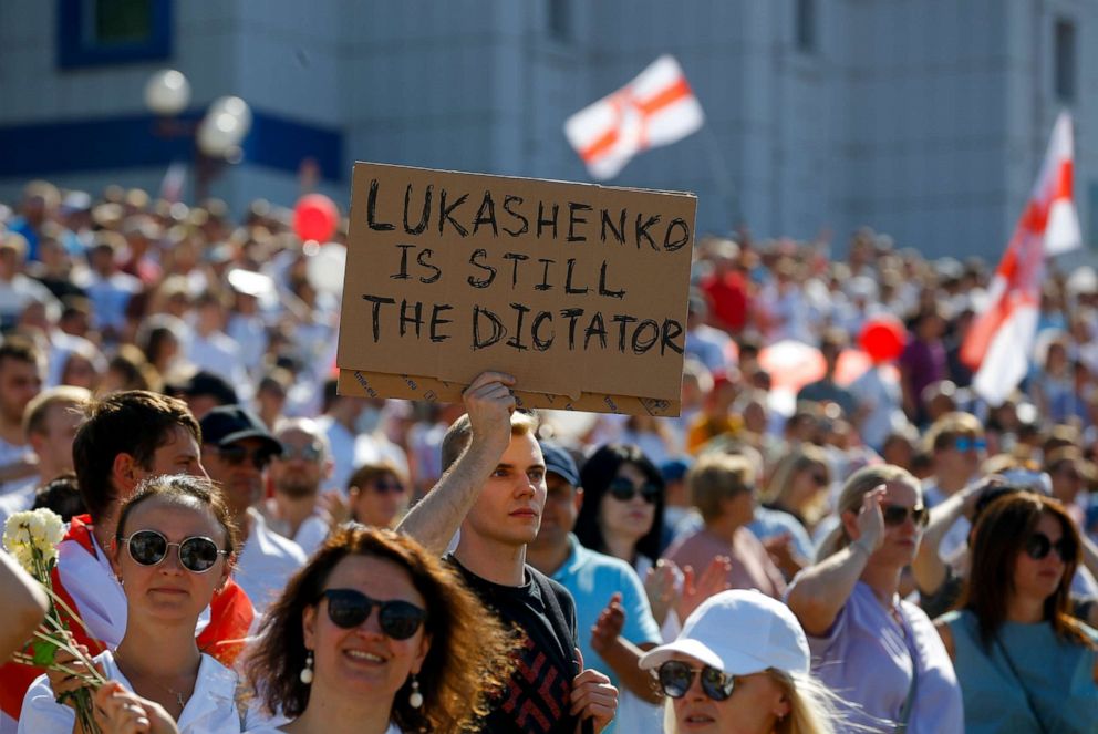 PHOTO: Belarusian opposition supporters rally in the center of Minsk, Belarus, Sunday, Aug. 16, 2020. 