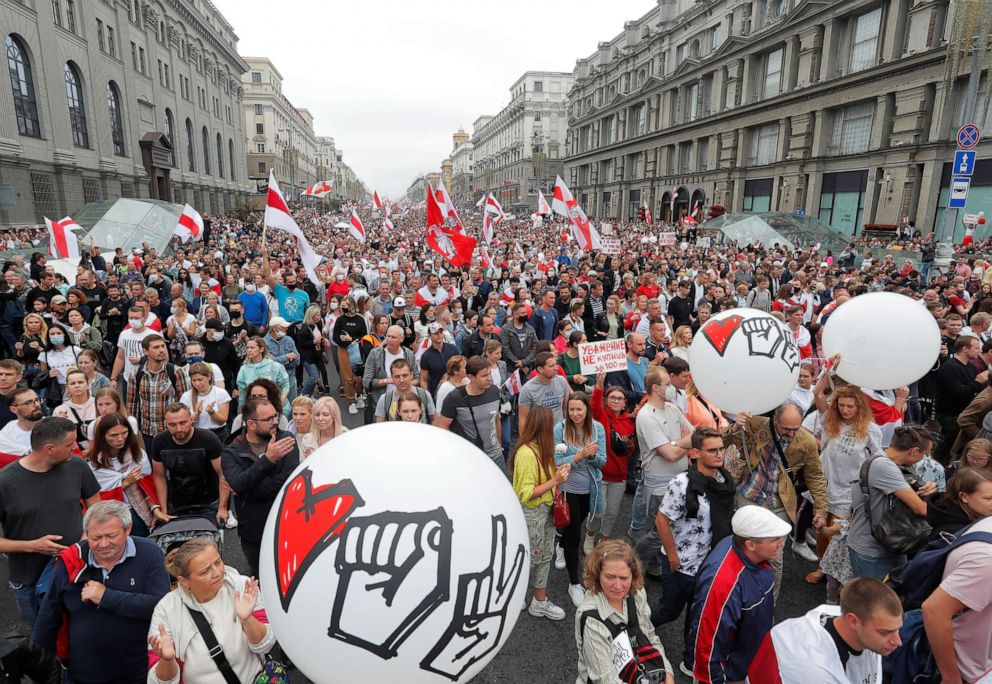 PHOTO: People march during an opposition demonstration to protest against presidential election results in Minsk, Belarus, Aug. 23, 2020.