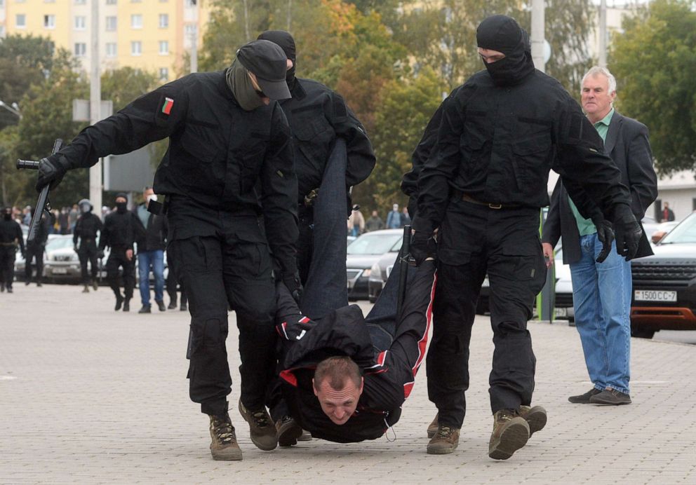 PHOTO: Belarusian policemen detain a protester during a rally to protest against the presidential election results in Minsk, Belarus, Sept. 27, 2020.