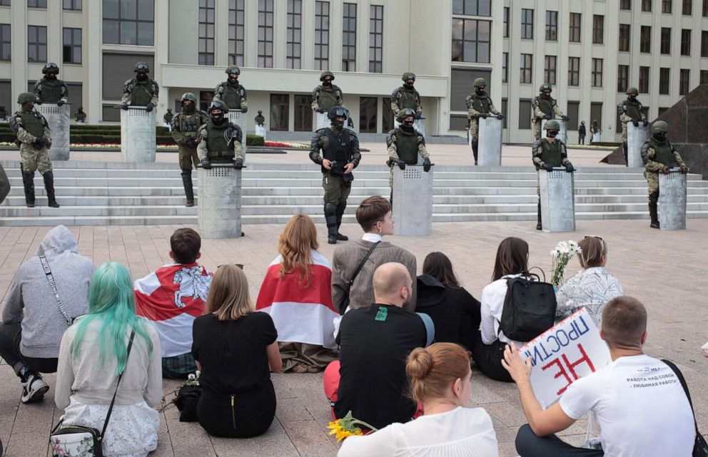 PHOTO:Law enforcement officers guard government buildings during a protest rally in Minsk, Belarus, Aug.14, 2020.