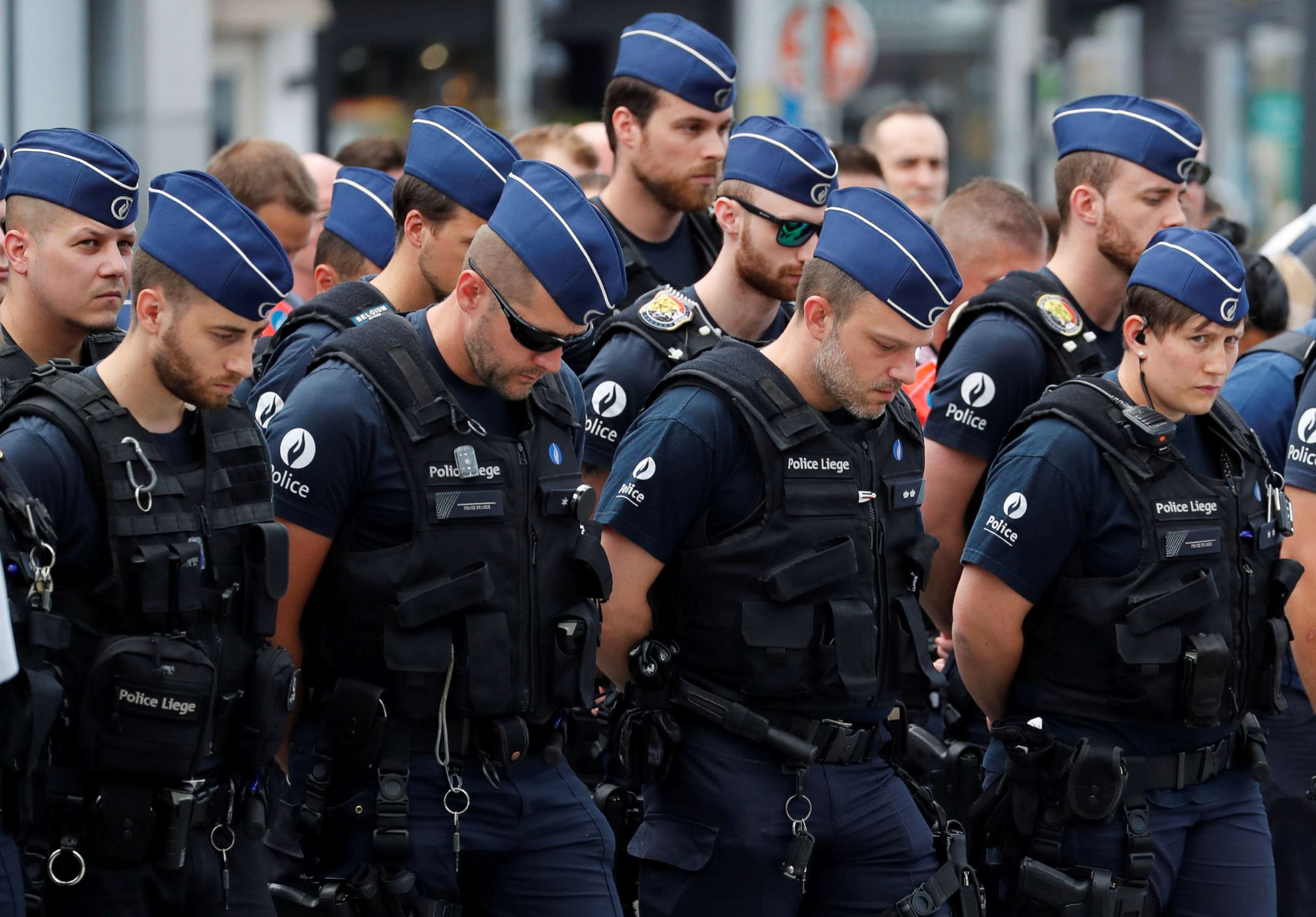 PHOTO: Policemen gather as they prepare to observe a minute of silence in Liege, Belgium May 30, 2018.