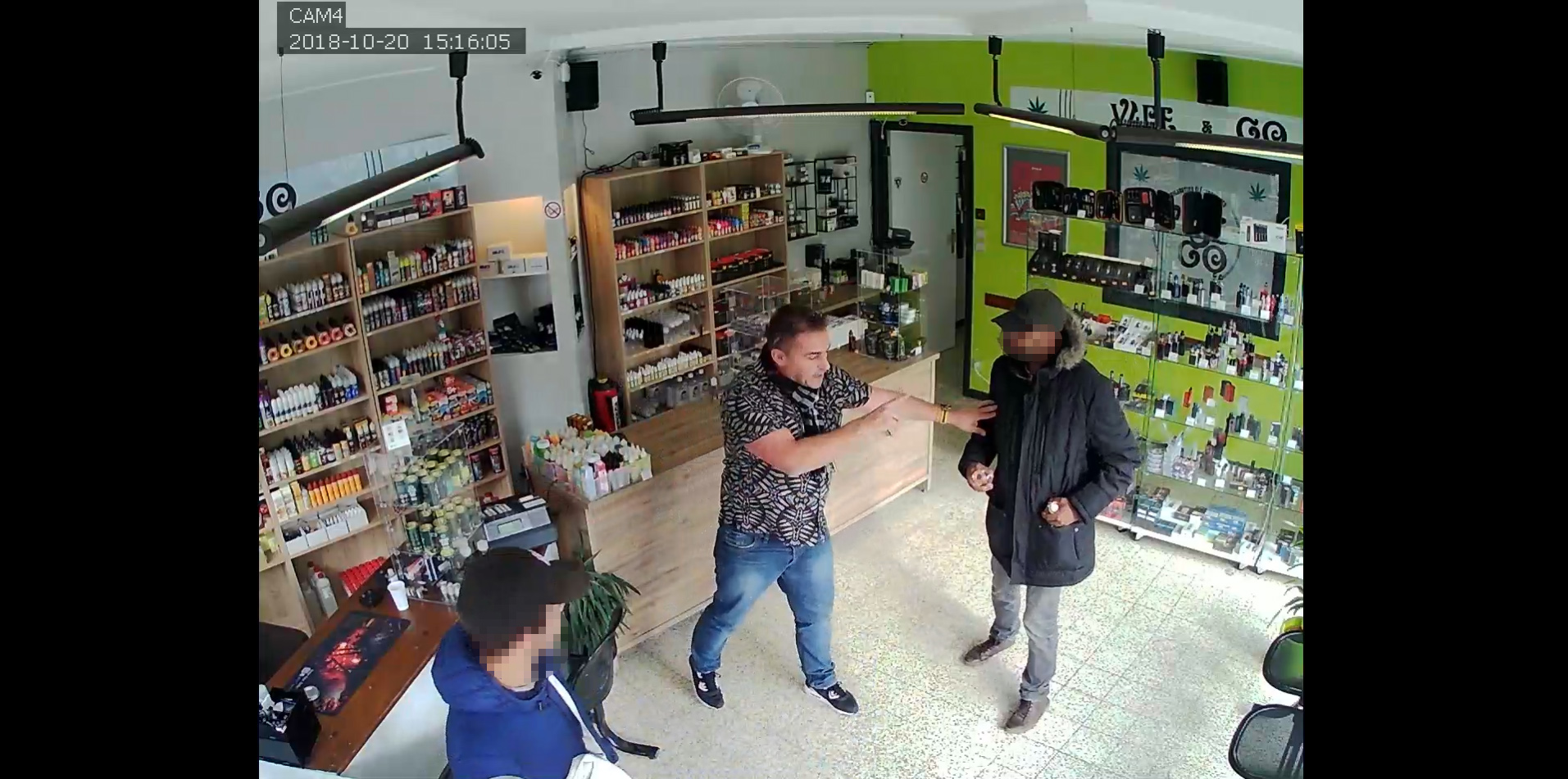 PHOTO: Men who police say attempted to rob an e-cigarette store in Montignies-sur-Sambre, Belgium, on Oct. 20, 2018, are convinced to leave the store by the owner who identified himself as Didier.