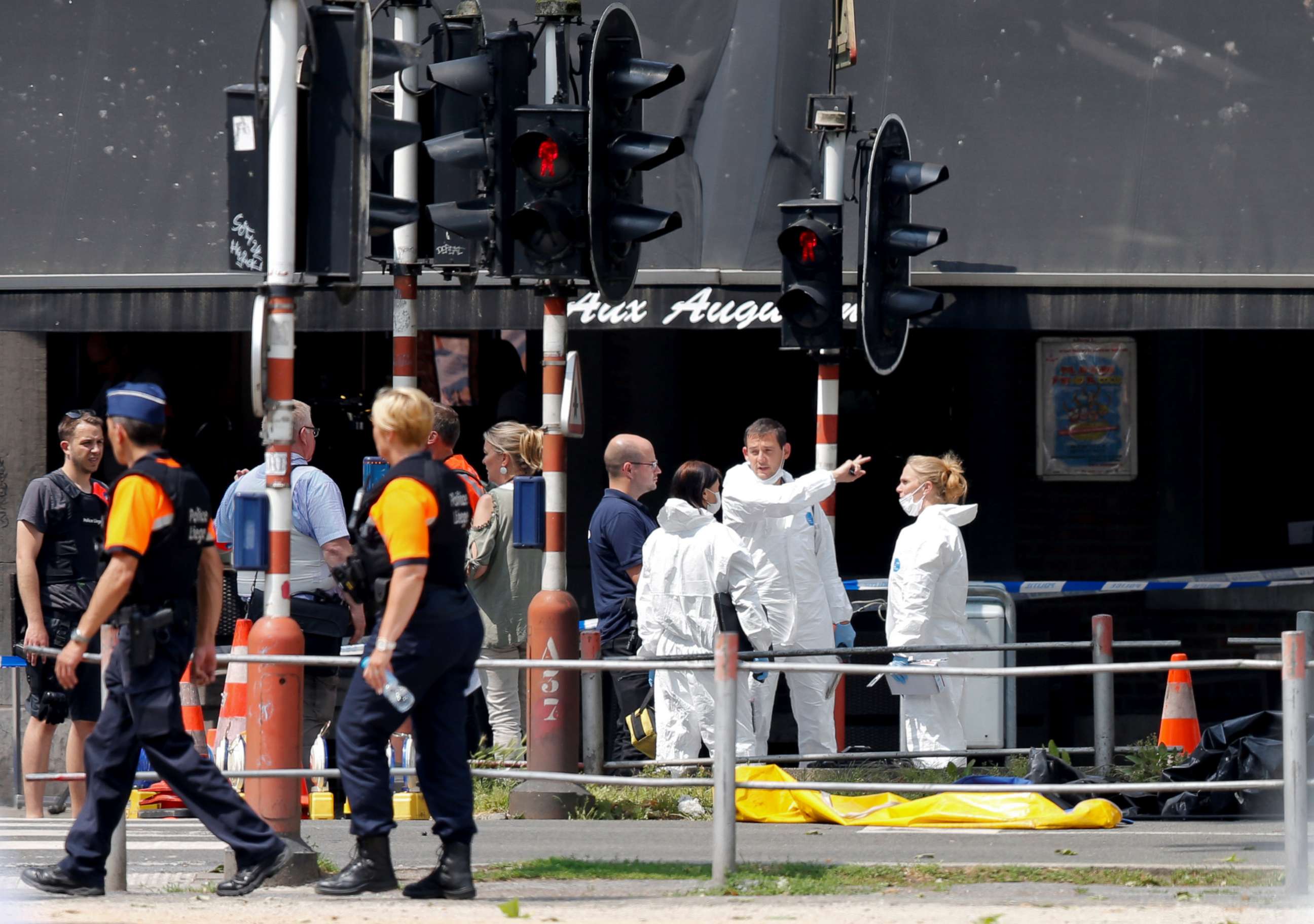 PHOTO: Forensics experts are seen on the scene of a shooting in Liege, Belgium, May 29, 2018.