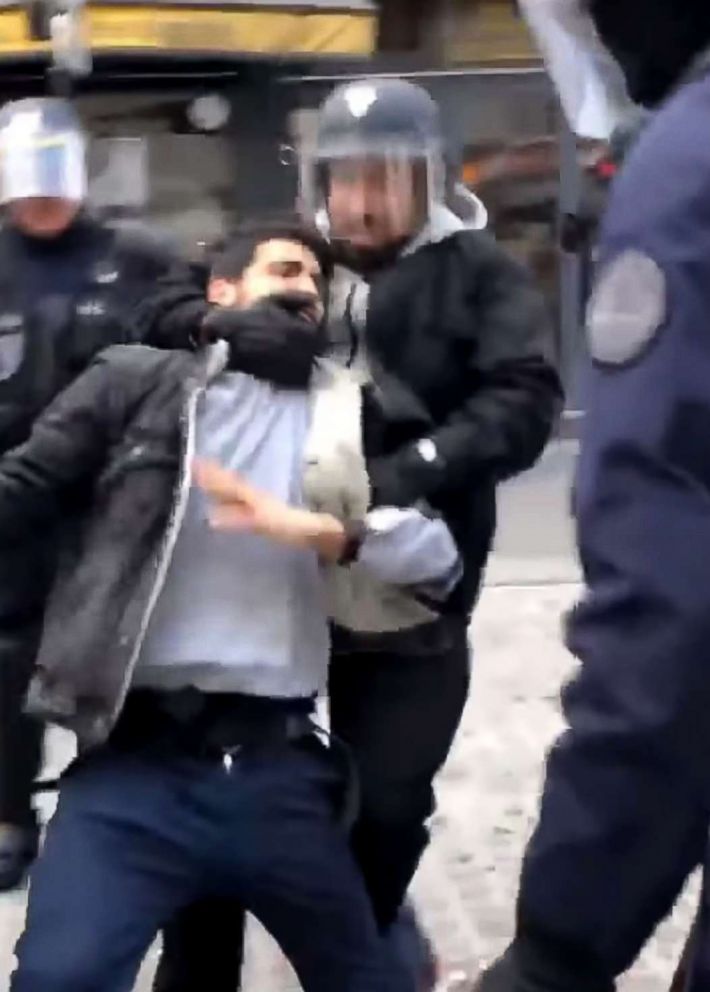 PHOTO: In this video grab taken on July 19, 2018 from footage filmed on May 1, 2018 shows a man identified as Elysee Chief Security Officer Alexandre Benalla wearing a police visor as he drags away a demonstrator during May 1 protests in Paris. 
