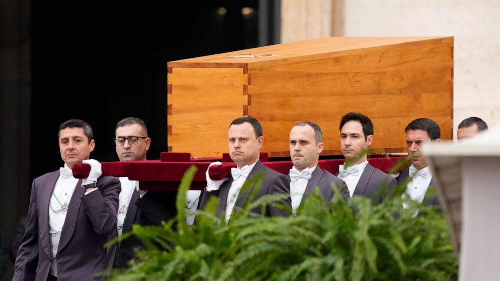 PHOTO: The coffin of the late Pope Emeritus Benedict XVI is carried to St Peter's Square for a funeral mass at the Vatican, Thursday, January 5, 2023.