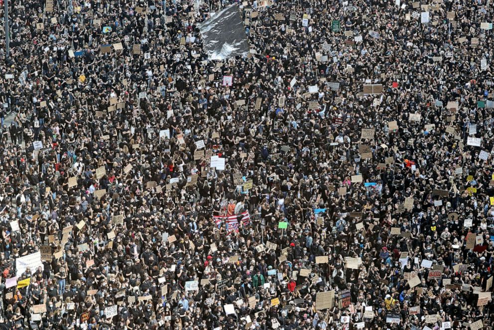 PHOTO: Demonstrators attend a protest against police brutality and the death in Minneapolis police custody of George Floyd, at Alexanderplatz in Berlin, June 6, 2020.