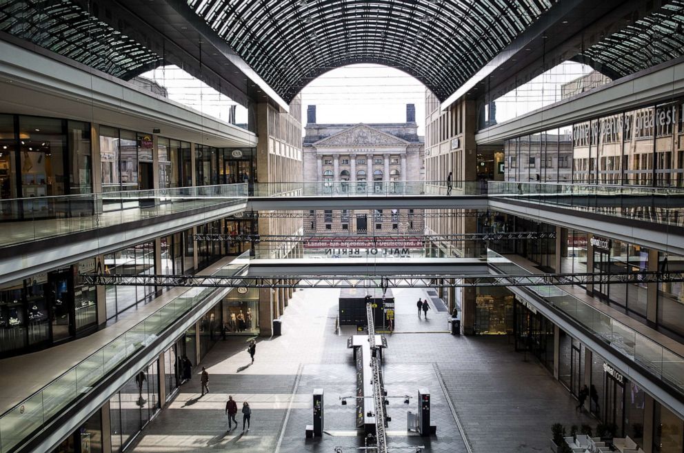 PHOTO: A few shoppers walk through a nearly empty mall, March 17, 2020 in Berlin, Germany.