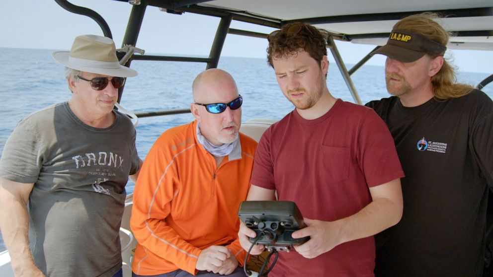 PHOTO: An undated photo shows underwater explorer, Michael C Barnette, left, and ROV operator, Quincy Andrews, right, inspecting the footage of the shipwreck being sent back by the ROV off the coast of Florida.