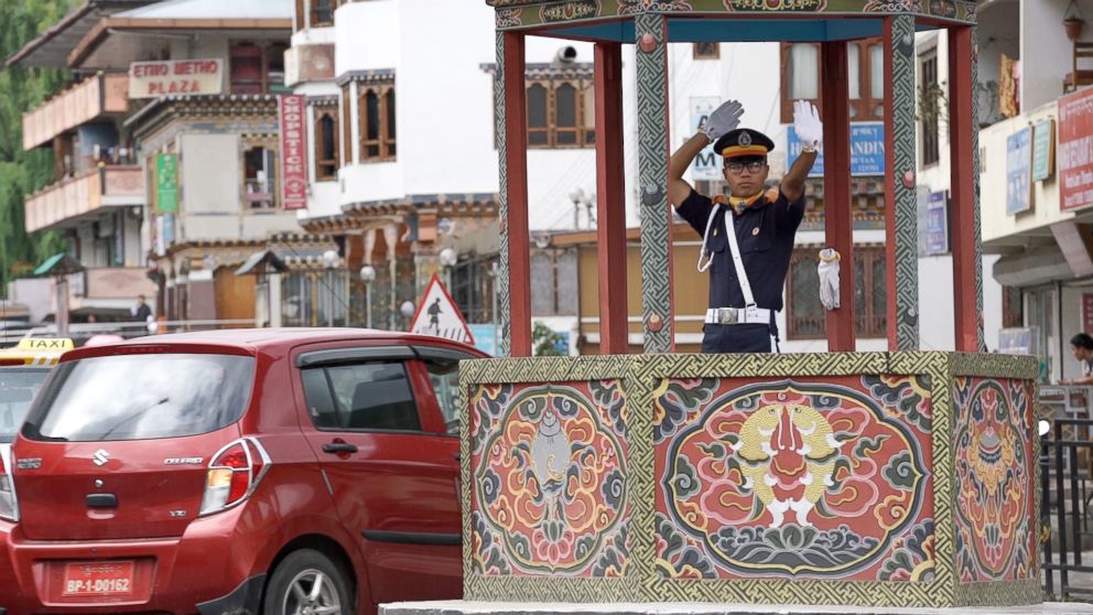 PHOTO: Bhutan still manages without a single traffic light in the entire country by choice and the busiest intersection of Thimphu is managed by a single traffic cop.