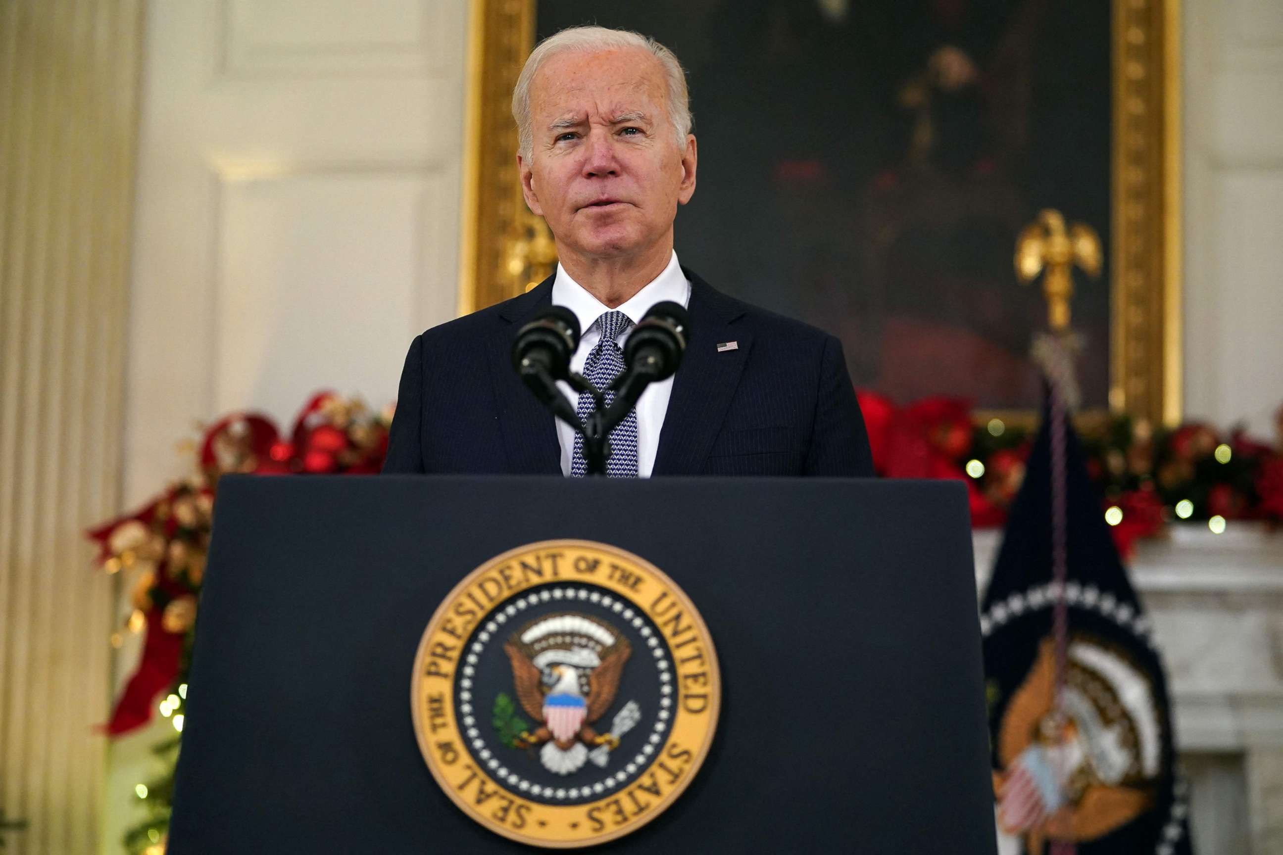PHOTO: President Joe Biden speaks about the November Jobs Report, which stated the US added 210,00 jobs last month, from the State Dining Room of the White House in Washington, on Dec. 3, 2021.