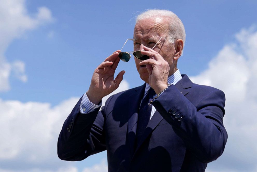 PHOTO: President Joe Biden puts on his sunglasses before boarding Air Force One for a trip to Cleveland, May 27, 2021, in Andrews Air Force Base, Md.