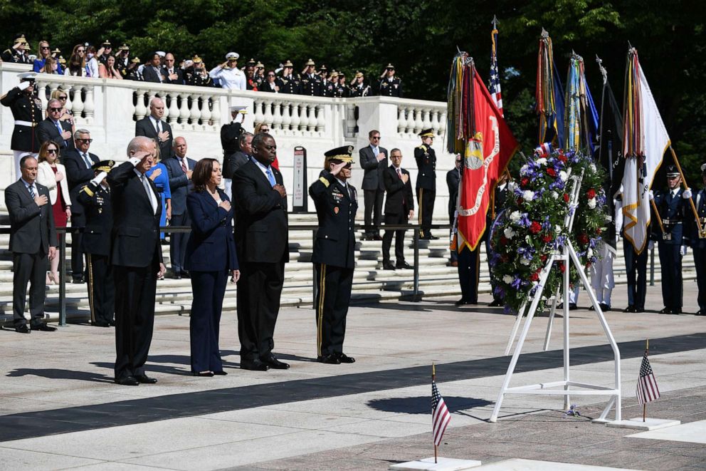 PHOTO: President Joe Biden, Vice President Kamala Harris, Defense Secretary Lloyd Austin and Major General Omar Jones take part in a wreath laying at the Tomb of the Unknown Soldier at Arlington National Cemetery in Arlington, Va. on May 31, 2021.