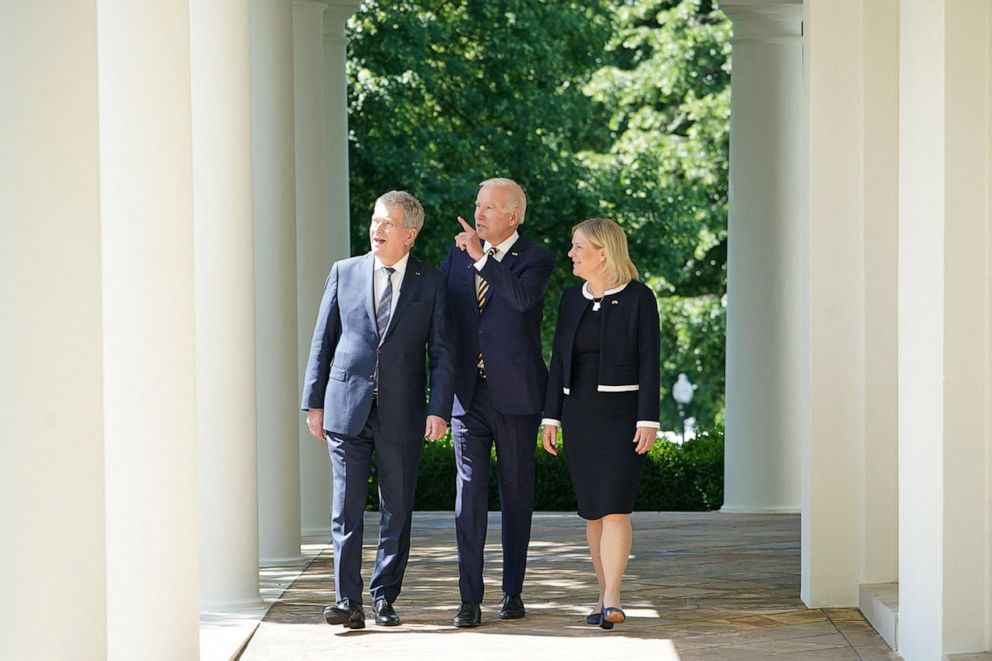 PHOTO: President Joe Biden, flanked by Swedens Prime Minister Magdalena Andersson and Finland's President Sauli Niinista, arrive to speak in the Rose Garden following a meeting at the White House in Washington, DC, on May 19, 2022.
