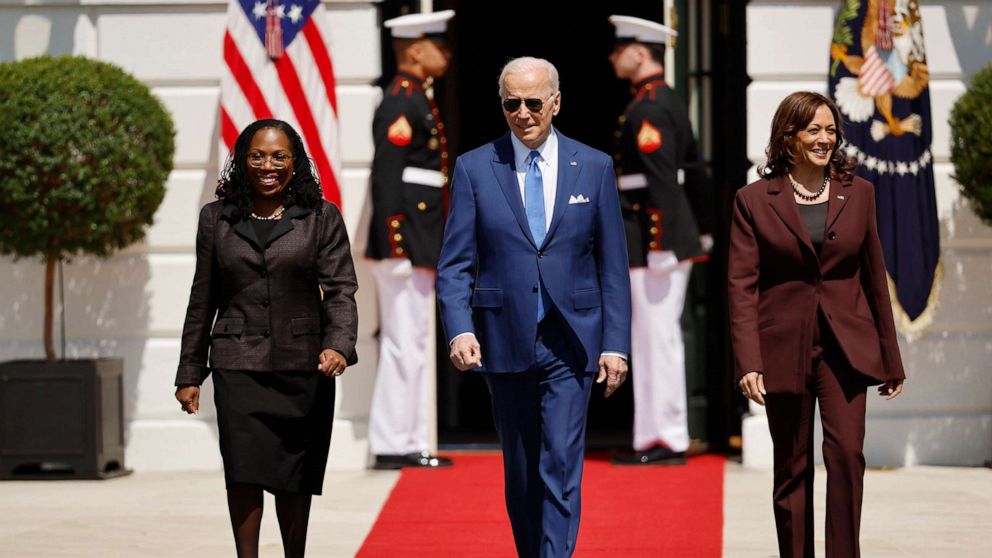 PHOTO: President Joe Biden and Vice President Kamala Harris, right, host Judge Ketanji Brown Jackson, left, for an event celebrating her confirmation to the U.S. Supreme Court on the South Lawn of the White House on April 08, 2022 in Washington.