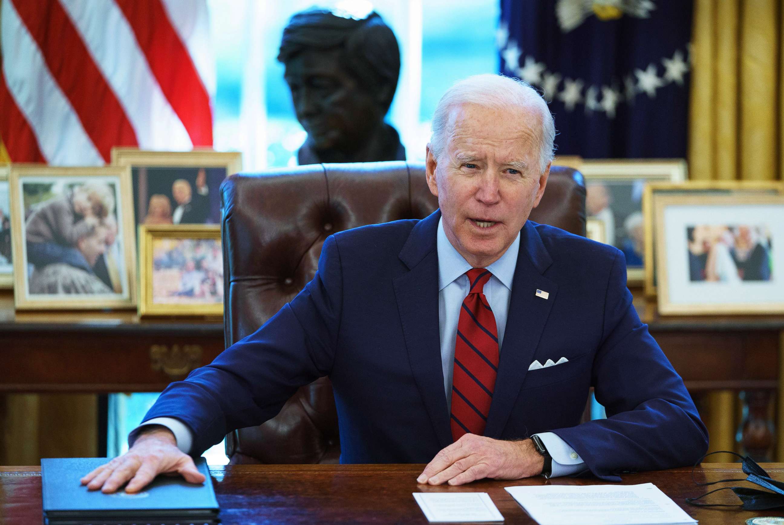 PHOTO: President Joe Biden speaks before signing executive orders on health care, in the Oval Office of the White House in Washington on Jan. 28, 2021.