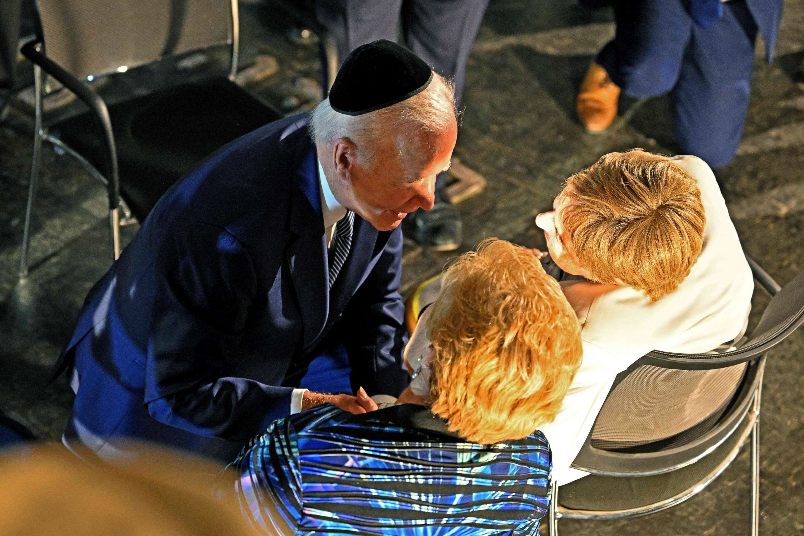 PHOTO: President Joe Biden speaks with Holocaust survivors Giselle Cycowicz (R) and Rena Quint in the Hall of Remembrance during a visit to the Yad Vashem Holocaust Remembrance Center in Jerusalem on July 13, 2022.