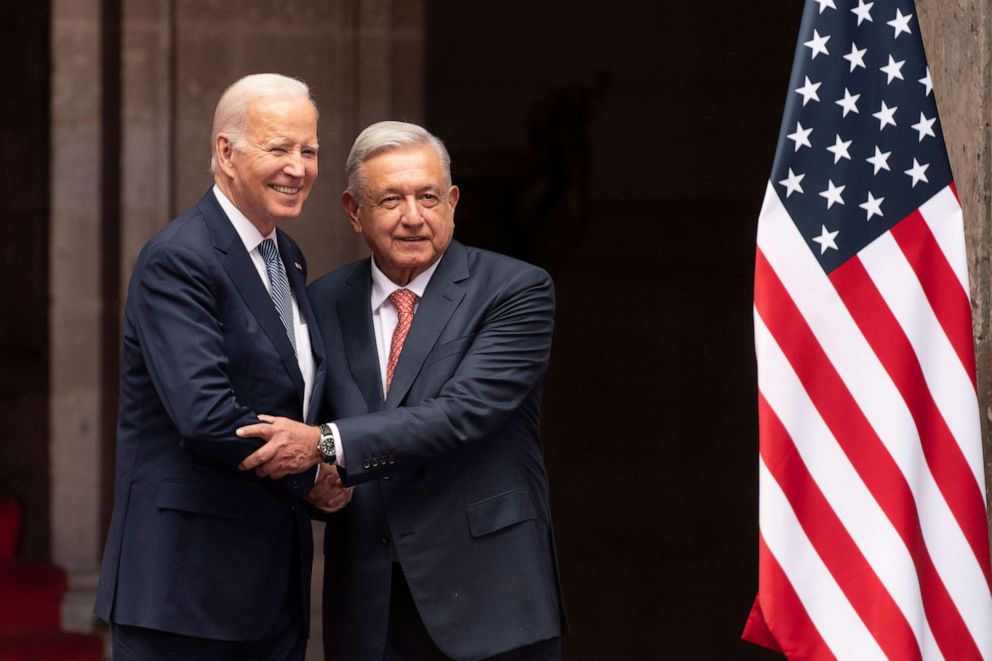 PHOTO: President Joe Biden is greeted by Mexican President Andres Manuel Lopez Obrador as he arrives at the National Palace in Mexico City, Mexico, Jan. 9, 2023.