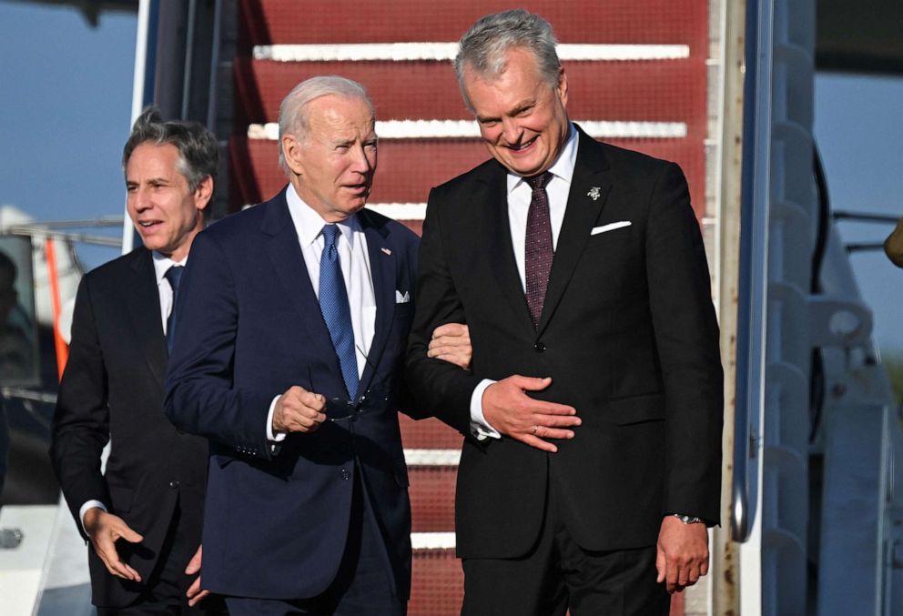 PHOTO: President Joe Biden, together with Secretary of State Antony Blinken, is greeted by Lithuanian President Gitanas Nauseda upon his arrival at Vilnius International Airport in Lithuania on July 10, 2023, for the NATO summit.