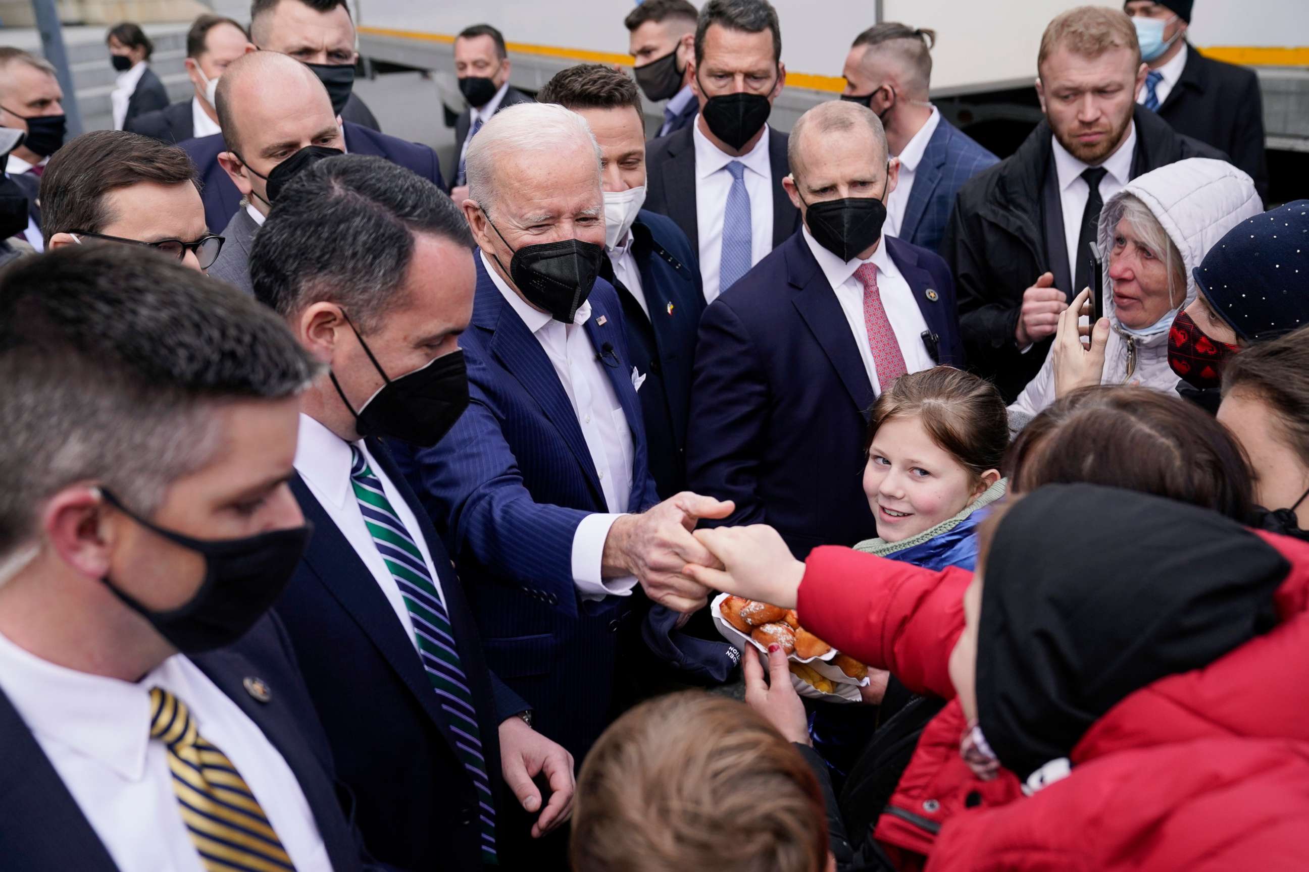 PHOTO: President Joe Biden meets with Ukrainian refugees and humanitarian aid workers during a visit to PGE Narodowy Stadium, on March 26, 2022, in Warsaw.
