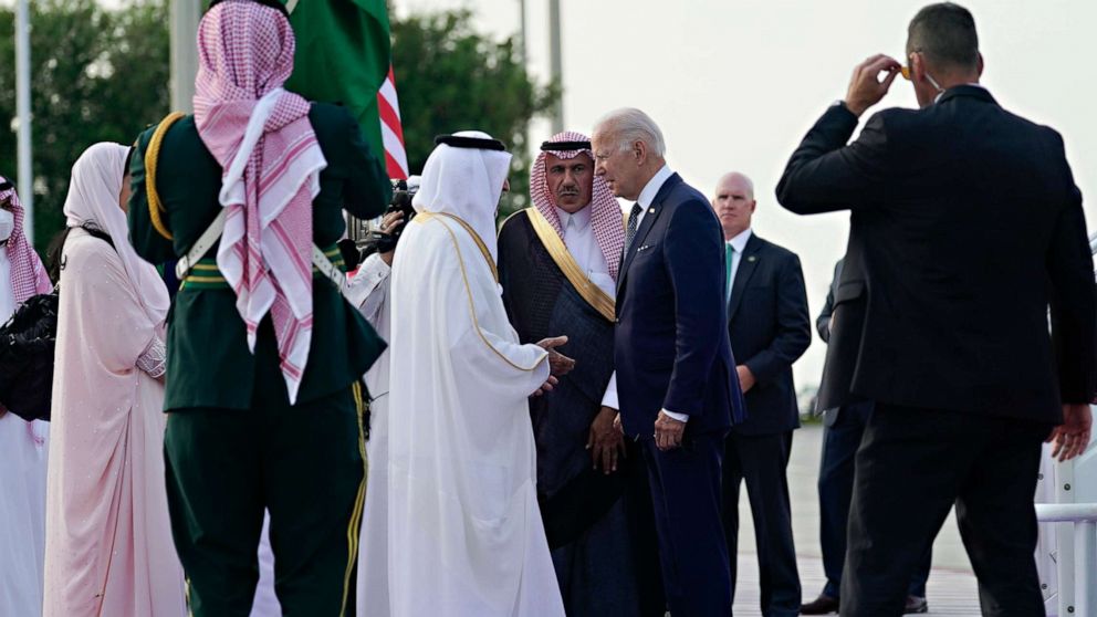 PHOTO: President Joe Biden is greeted by Saudi Arabia officials as he arrives at King Abdulaziz International Airport, July 15, 2022, in Jeddah, Saudi Arabia.