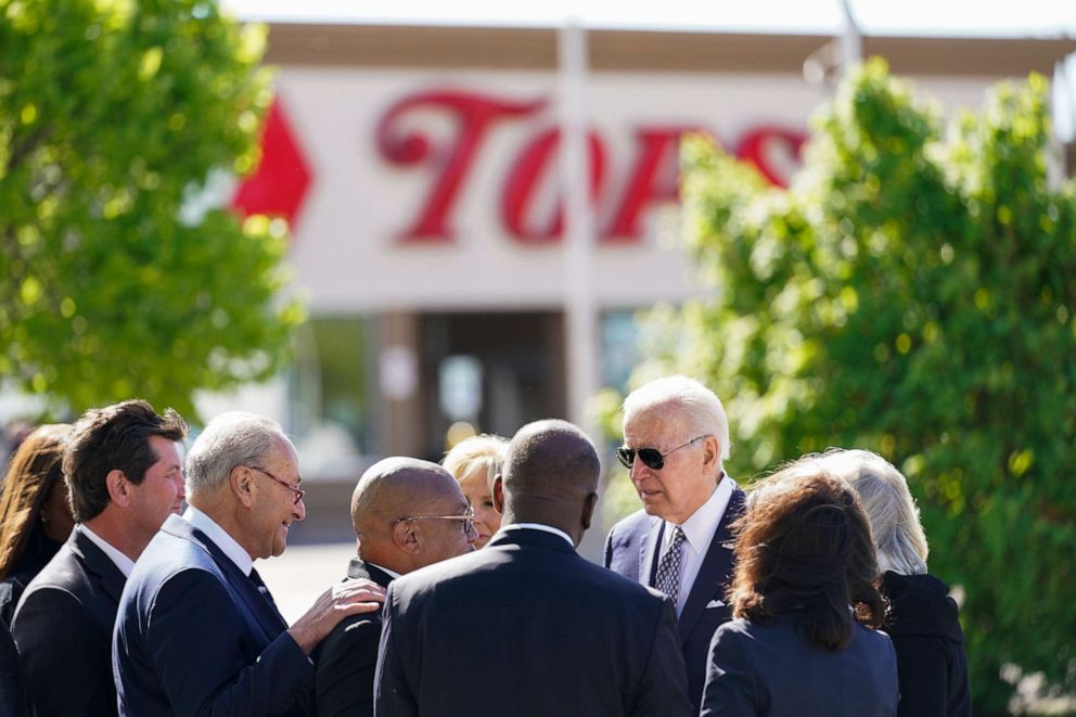 PHOTO: President Joe Biden visits the scene of a shooting at a Tops supermarket to pay respects and speak to families of the victims of Saturday's shooting in Buffalo, N.Y., May 17, 2022. Senate Majority Leader Chuck Schumer of N.Y. is second from left.