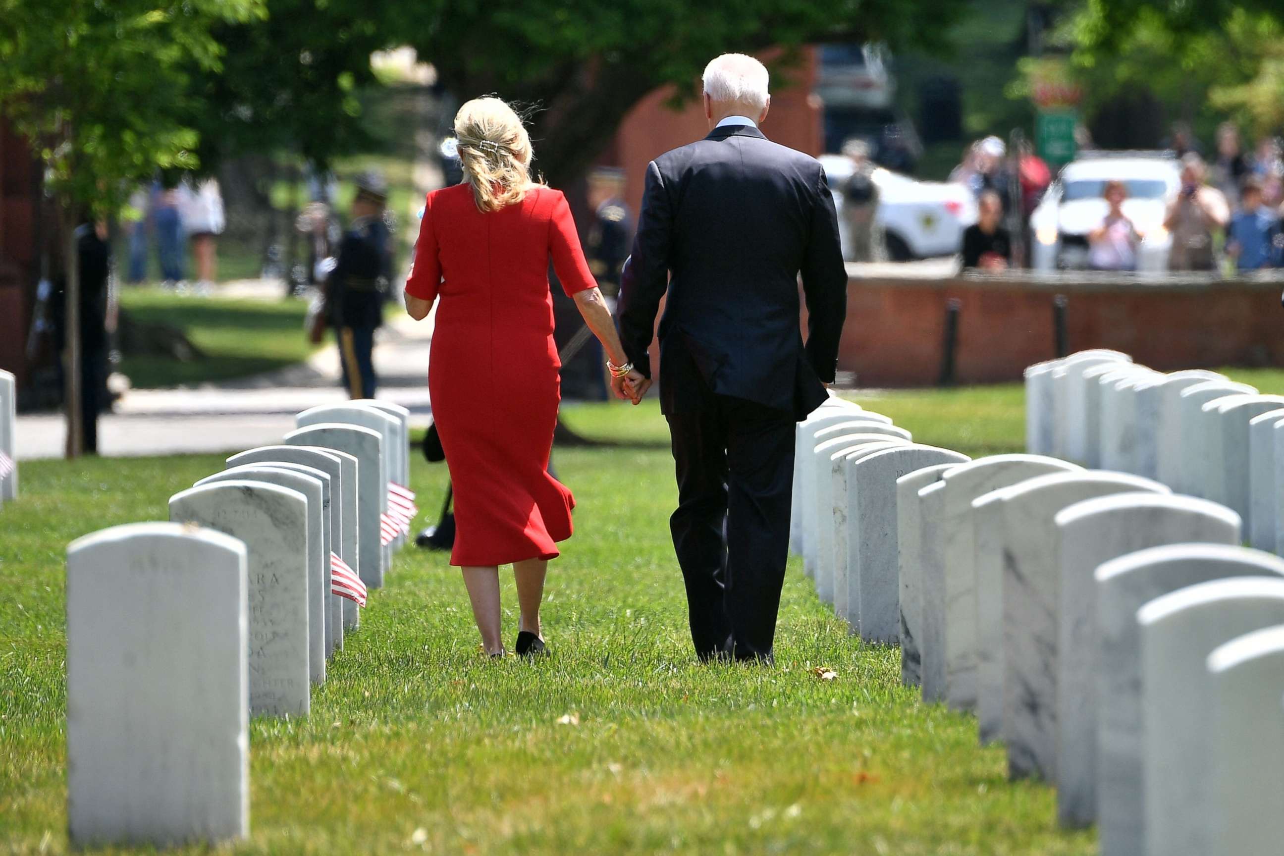 PHOTO: President Joe Biden and first lady Jill Biden return to their vehicle after the 153rd National Memorial Day Observance in Arlington National Cemetery on Memorial Day in Arlington, Va. on May 31, 2021.