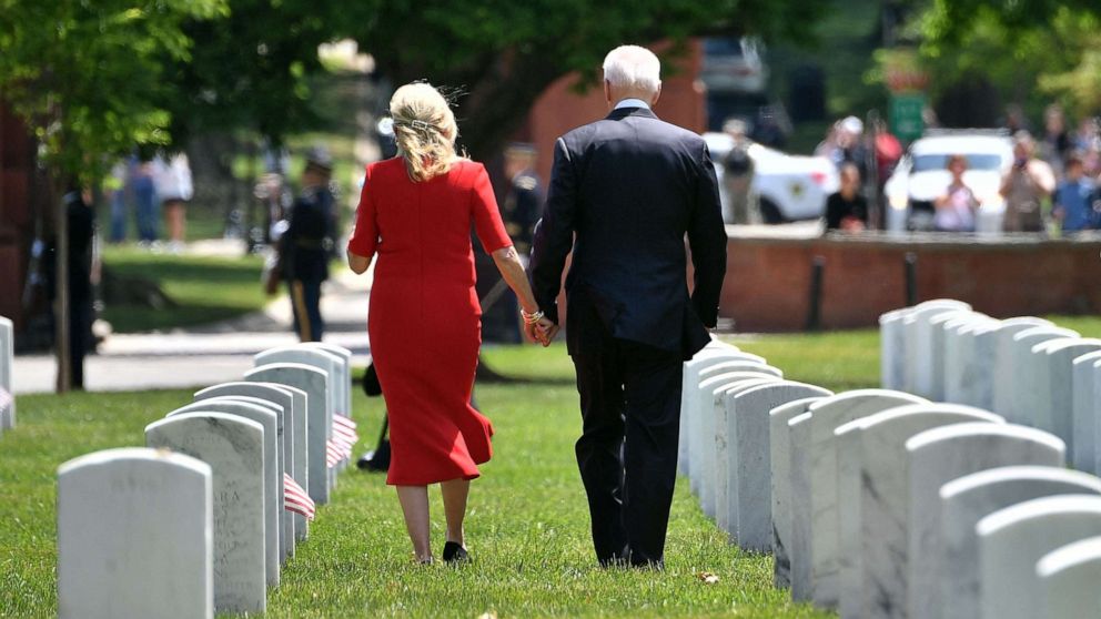 PHOTO: President Joe Biden and first lady Jill Biden return to their vehicle after the 153rd National Memorial Day Observance in Arlington National Cemetery on Memorial Day in Arlington, Va. on May 31, 2021.