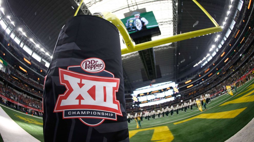 PHOTO: In this Dec. 7, 2019, file photo, a Big 12 logo is shown as the Baylor Bears band plays on the field before Baylor plays the Oklahoma Sooners in the Big 12 Football Championship at AT&T Stadium in Arlington, Texas.